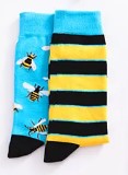 Bee stripe odd socks half folded laid flat