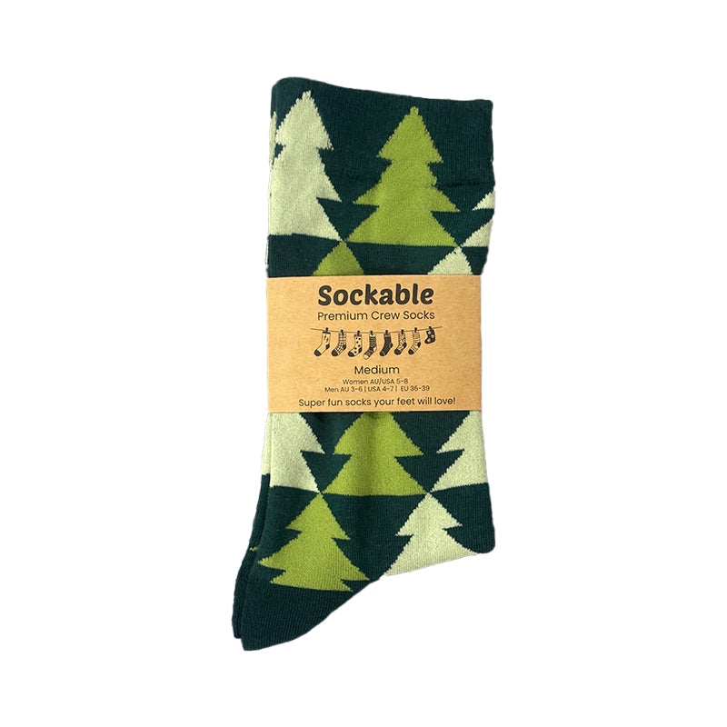 Sockable labeled premium crew socks with green tree pattern on a white background
