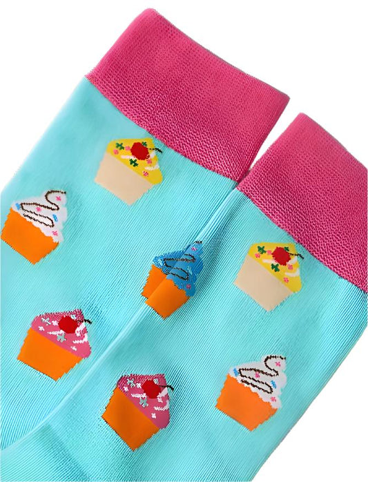 Close up image of cupcake socks with pink cuff and cupcake print