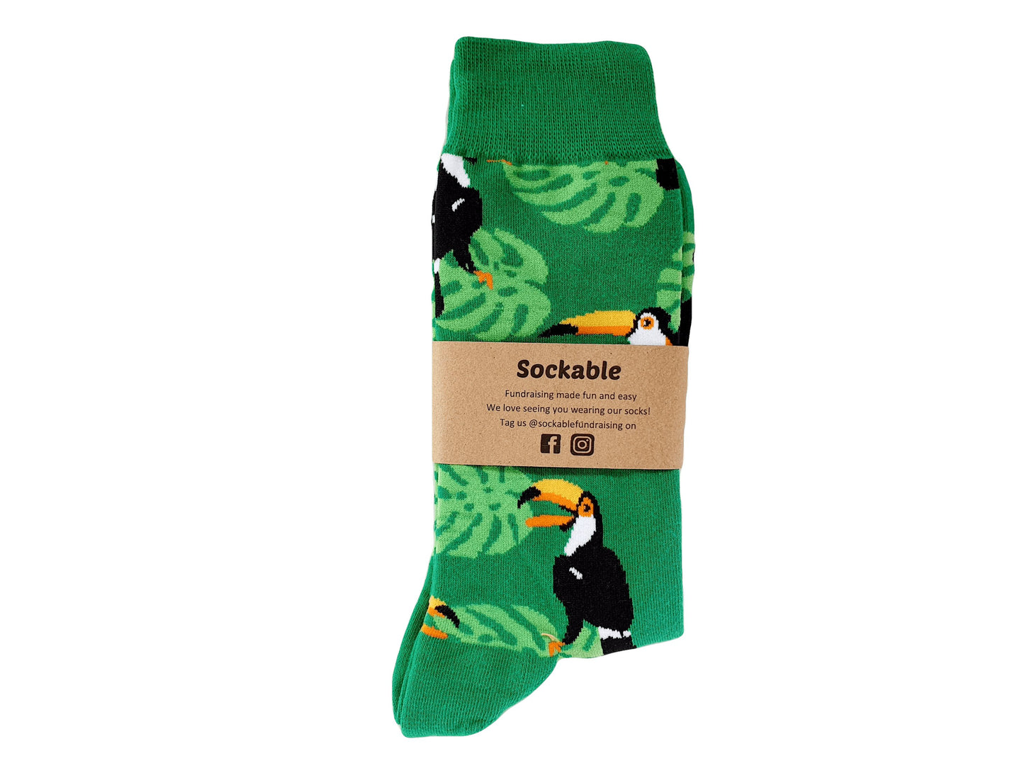 Green Toucan bird socks with recycled card label ready for gifting or fundraising