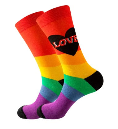 Rainbow striped socks with heart and the word LOVE on a mannequin