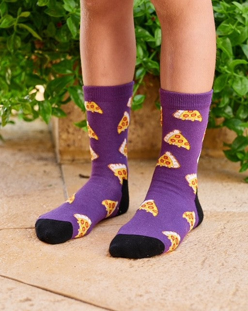 Purple pizza socks being worn by model