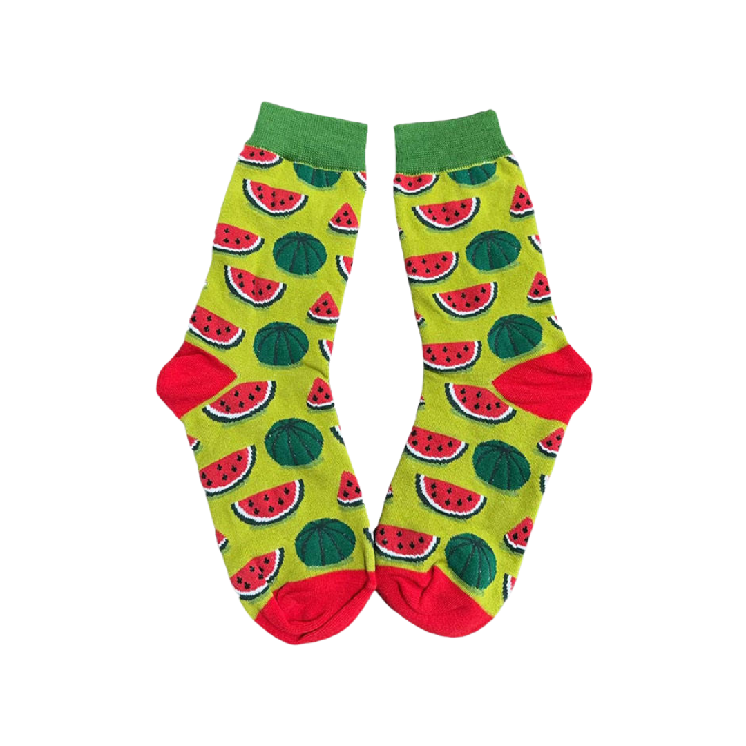 Green watermelon socks with red heel and toe laid flat