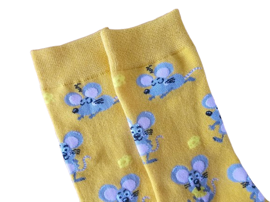 Close up of yellow mouse print socks laid flat