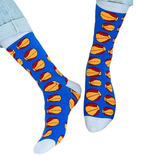 Model wearing blue socks with orange basketball design