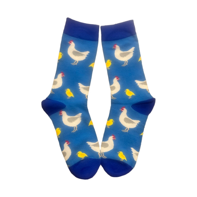 Blue socks with chicken pattern on a white background