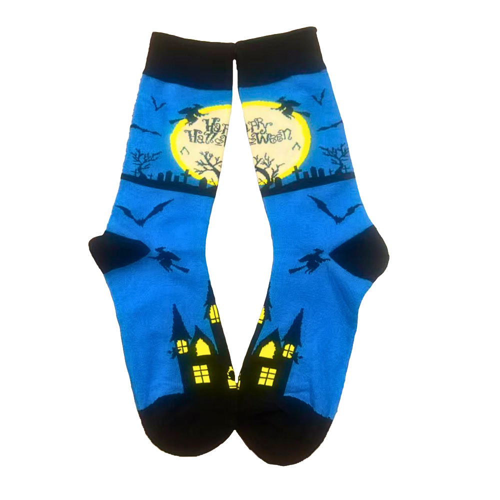 Halloween-themed socks with witch hats and houses on a blue background