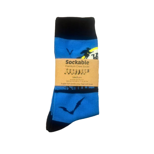 Blue and black Halloween sock with 'Sockable' packaging on a white background