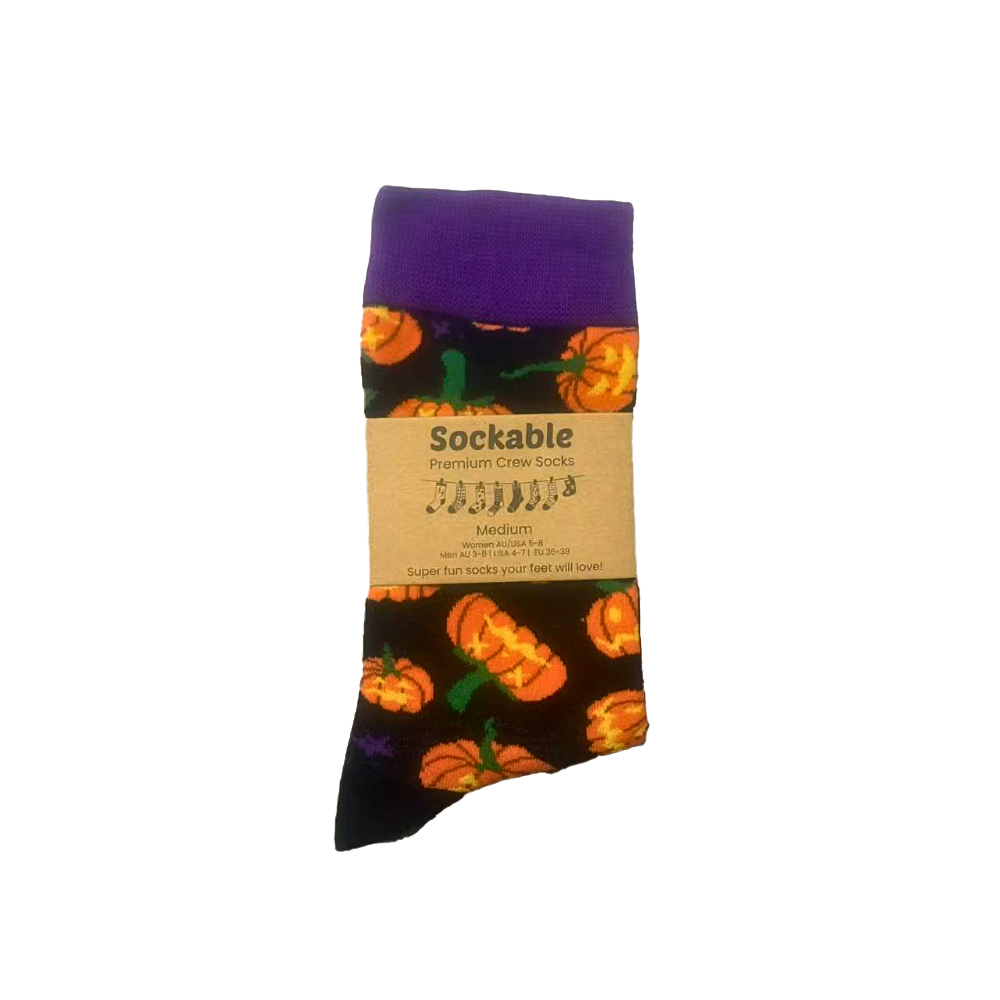 Halloween-themed sock with pumpkins on a white background with Sockable Label