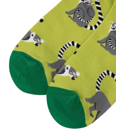 A closeup of the toe of lime lemur socks