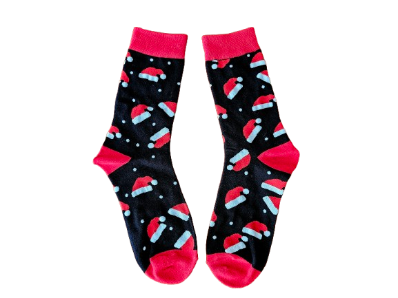 Pair of socks with Santa hats  on a black background