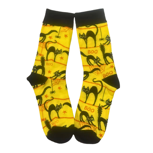 Pair of socks with black cat and 'BOO' pattern on yellow background