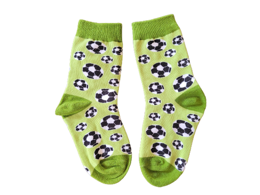 Green kids socks with soccer ball design laid flat