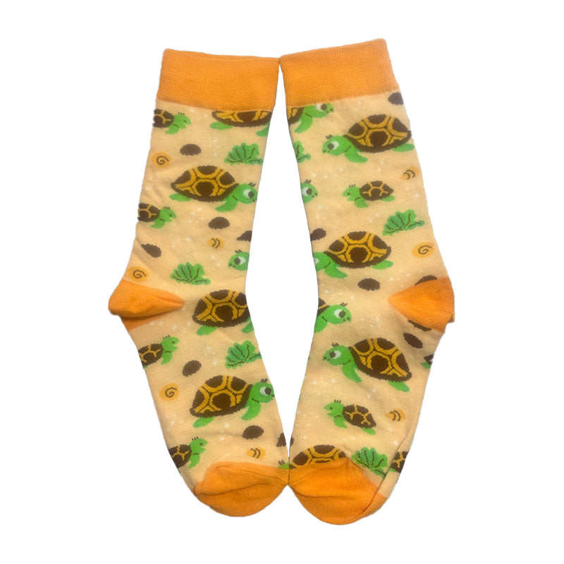 Socks with turtle pattern on a beige background